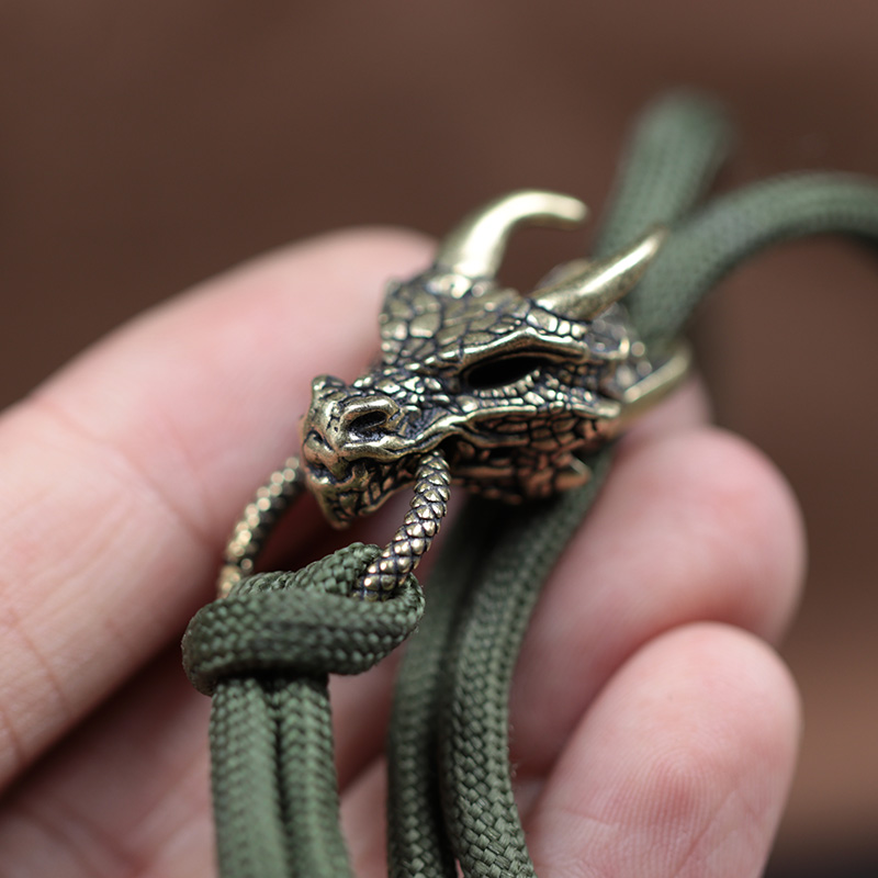 Латунная пряжка в виде головы  – обзор и цена Paracord Survival Bracelet